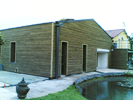 Extension d'habitation à Herlies : ossature bois, isolant laine de bois, revêtement pin Douglas.
